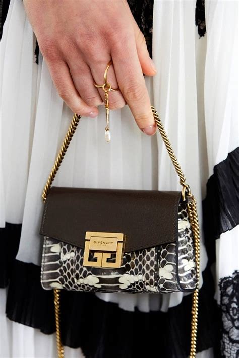 spot fake givenchy nightingale bag|givenchy iconic black pouch.